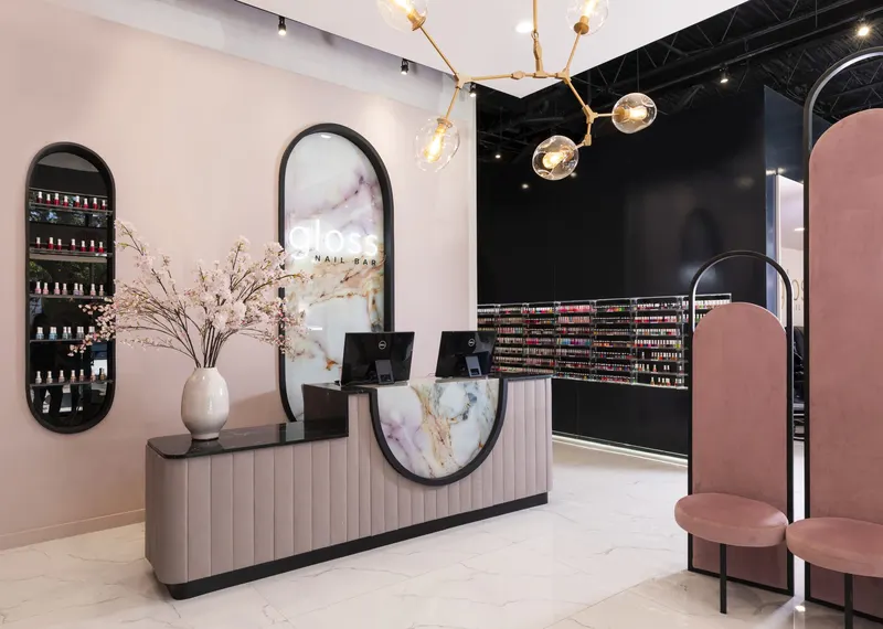 Reception desk and backlit retail display wall