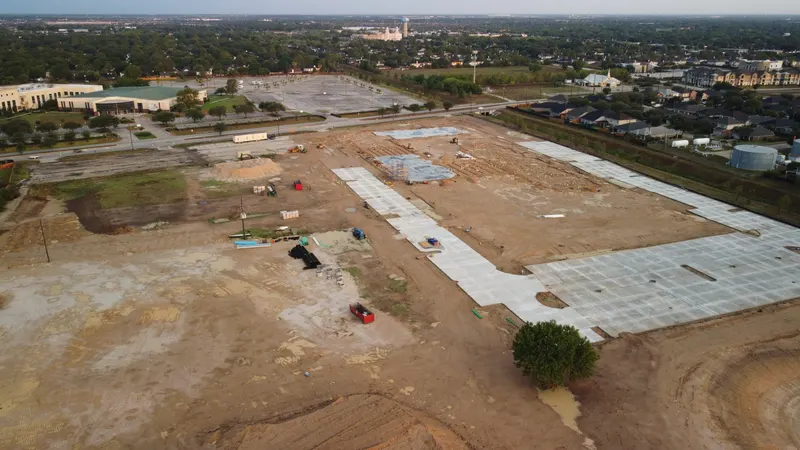 Building pads and site utilities under construction