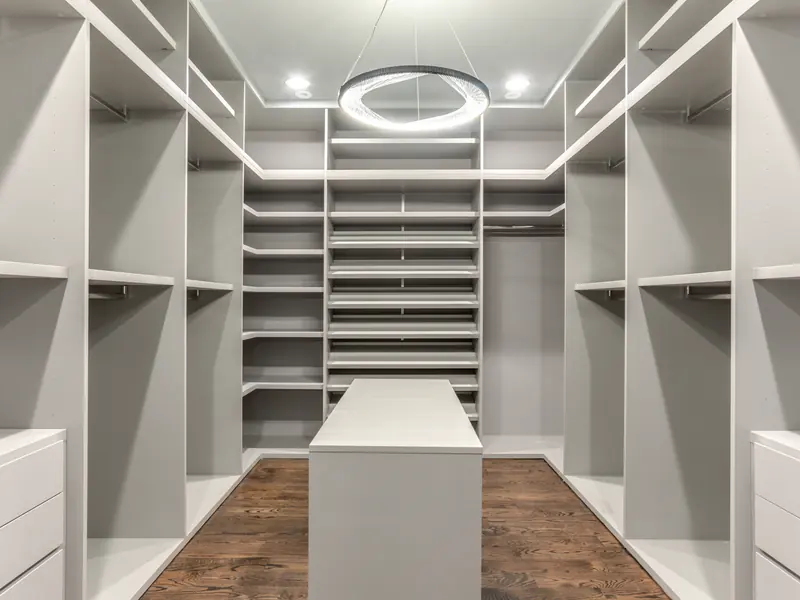 Walk-in closet with center island and ring light