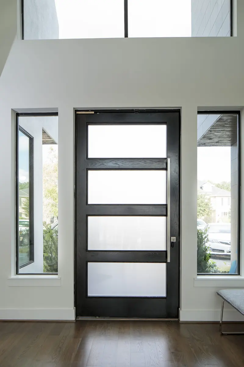 Modern front door with frosted glass panels