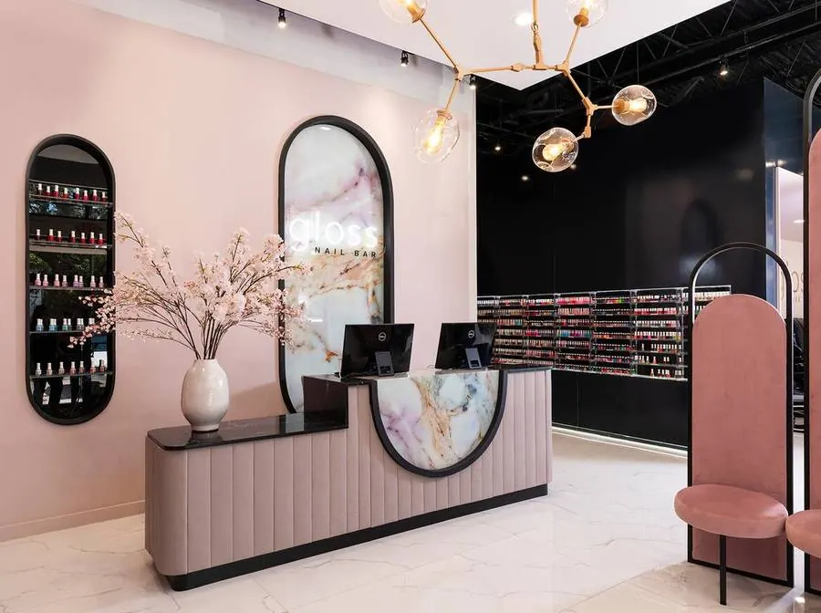 Gloss retail interior with signature arches, built by Capital Builders
